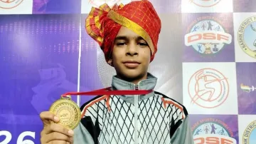 Bibhuti Patel poses with his gold medal