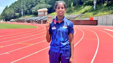 Sabita Toppo poses with her medal