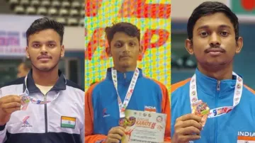 Odisha karatekas pose with their medals