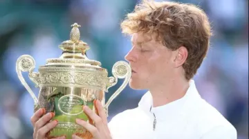 Jannik Sinner with Wimbledon Trophy 