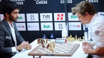 Magnus Carlsen slams his table in anger against D Gukesh