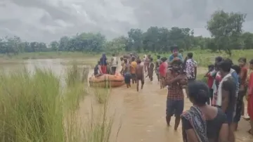 Women helplessly stuck in middle of river in Odisha after flash flood