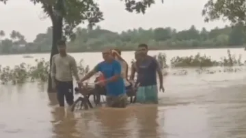Odisha doctor risks his life, walks through flood to rescue pregnant woman in labour