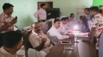 Power cut woes: IAS officer hears public grievances under mobile phone torchlight in Odisha