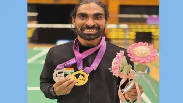 Pramod Bhagat poses with his medals