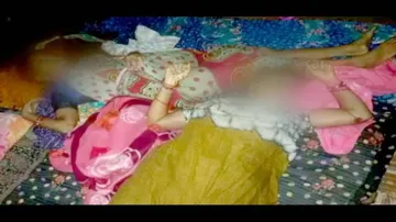Woman, 2 daughters found dead inside locked room