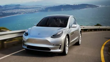 First Tesla Model 3 electric car rolling off production line
