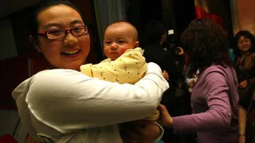 China's first test-tube baby becomes mother