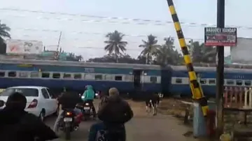 Train whizzes past open level crossing in Odisha; 2 railway staff suspended
