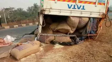 Rice-laden truck turns turtle on highway in Balasore
