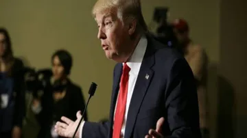Pushed to second place, Trump asks Republican rivals to drop out