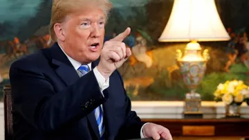 Trump warns trading countries against doing business with Iran