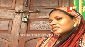 Holding on to dead child, woman waits for justice at in-laws house 