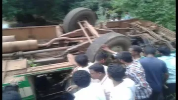 One killed, 30 injured as bus falls off bridge