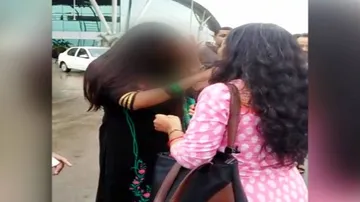 Wife hits woman in public suspecting illicit relationship with husband
