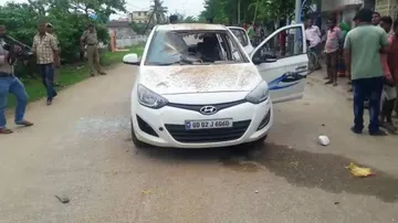 Miscreants target car with crude bombs in Berhampur; 4 injured
