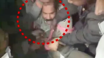 Cop thrashed in public for misbehaving with woman