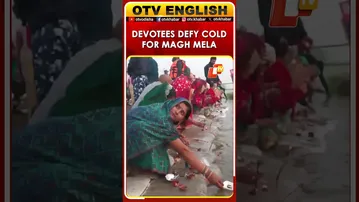 Devotees Take Holy Dip At Sangam, Prayagraj, UP During Magh Mela Amid Cold