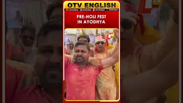 People Dance With Colours & Flower Petals Ahead Of Holi In Ayodhya