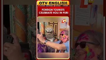 Foreign Tourists Celebrate Holi With Enthusiasm In Puri, Odisha