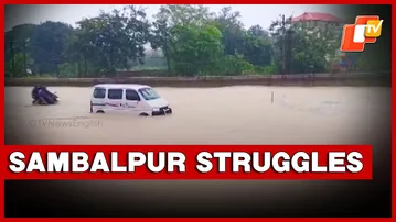 Flood-Hit Sambalpur Families Dry Papers, Essentials On Roadsides