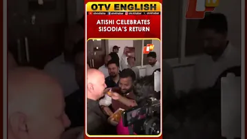 AAP Leader Sisodia Hugs Atishi At His Residence After Acquittal In Delhi Liquor Policy Case