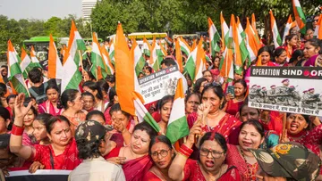 BJP women workers attend a Tiranga Rally to hail the Indian armed forces' Operation Sindoor, in New Delhi.