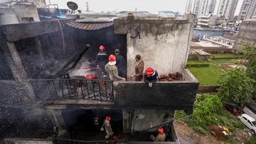 Firefighters try to douse a fire that broke out in a chemical factory, at Rithala, in New Delhi, Wednesday, June 25, 2025. At least four people were killed in the incident.