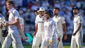 England's batters Zak Crawley and Ben Duckett and Indian players walk off the field at the end of the third day's play during the third Test match at the Lord's Cricket Ground, in London, Saturday, July 12, 2025.