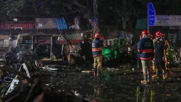 Firefighters at the spot after a blast occurred in a parked car near Red Fort, leaving multiple vehicles in flames, in New Delhi, Monday, Nov. 10, 2025. At least one person was killed in the incident.
