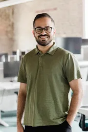 Karan Khanna portrait with digital product management and AI concept graphics background