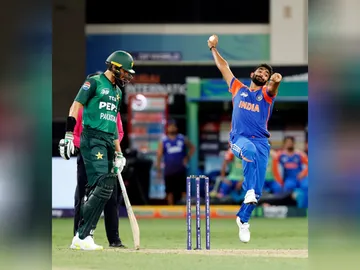 Pakistan's Shaheen Afridi and India quick Jasprit Bumrah (Photo/ANI)