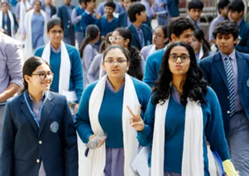 New Delhi: Students come out of an examination centre after appearing for the CBSE board exam