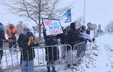 About 100 clergy arrested at Minneapolis airport in anti-ICE protest