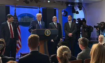 Donald Trump addresses press briefing at White House