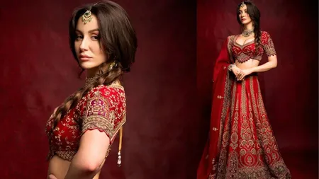 Giorgia Andriani Stuns in Madhuban's Red Bridal Lehenga Masterpiece
