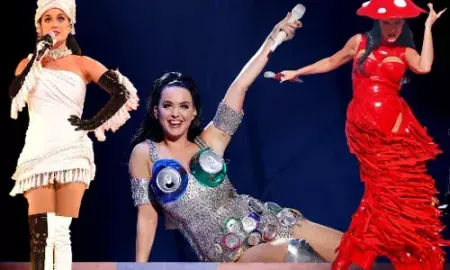 Katy Perry's wild look at Las Vegas show, served up outrageous outfits from a can-dress to a feathered rainbow train