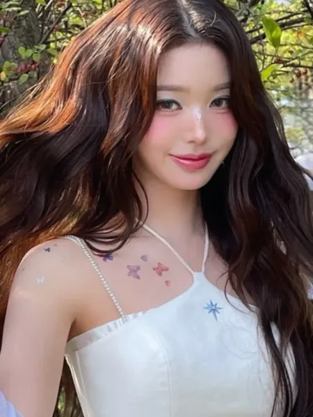 IVE Wonyoung Looks Breathtaking in White Outfit