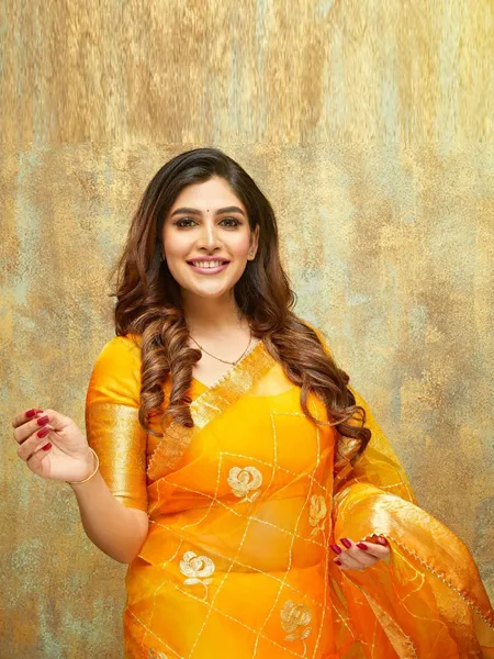 Mira Jagannath Orange Saree