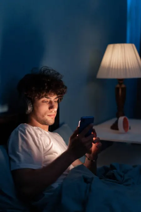 mobile in bed