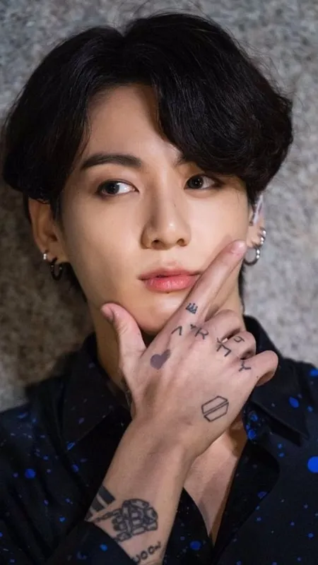 Jungkook has many tattoos on his right arm. Do you know the hidden meaning behind them?