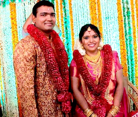 IAS Anju Arun Kumar with husband