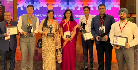 IAS Rishav Gupta receiving award