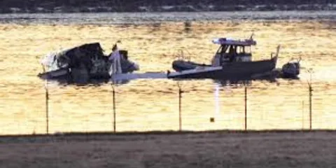 Midair Collision Between An American Airlines Jet And An Army Helicopter Kills All 67 People Onboard