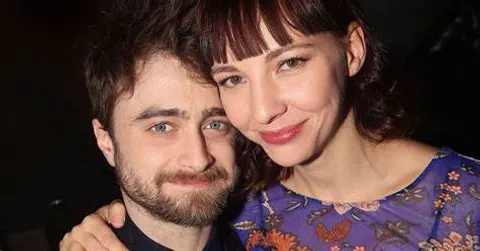 Daniel Radcliffe and Erin Darke showcase their newborn at SAG picket line