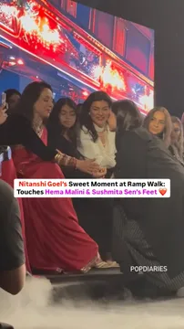 During a rampwalk Nitanshi Goel shows respect to Hema Malini by taking blessing from her and hug's  Sushmita Sen