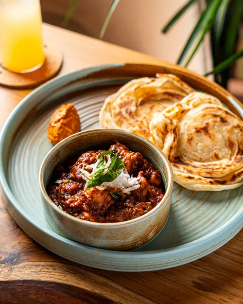 Chicken Pepper Fry, Malabar Parotta, Tomato Chutney