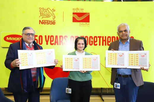 Shri Aakash Deep Chakravarti, Post Master General, Gurugram hands over Commemorative stamp to Mr. Manish Tiwary and Ms. Rupali Rattan