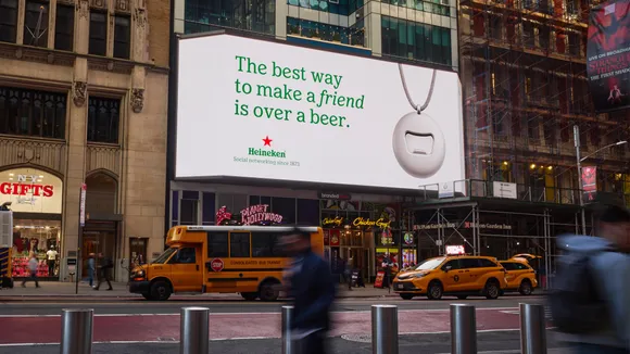 Billboard reading 'The best way to make a friend is over a beer'
