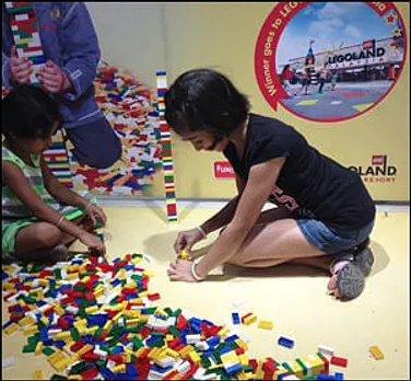 Build, don't break, urges Lego